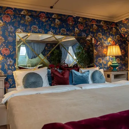 Hotell Charmante Skostredet