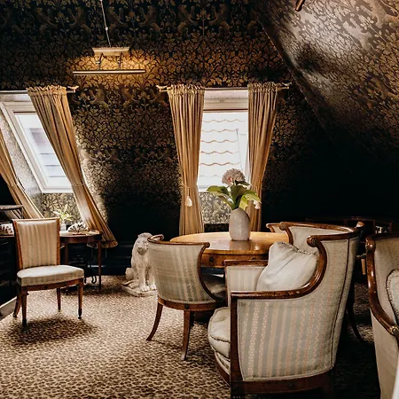 Hotell Charmante Skostredet